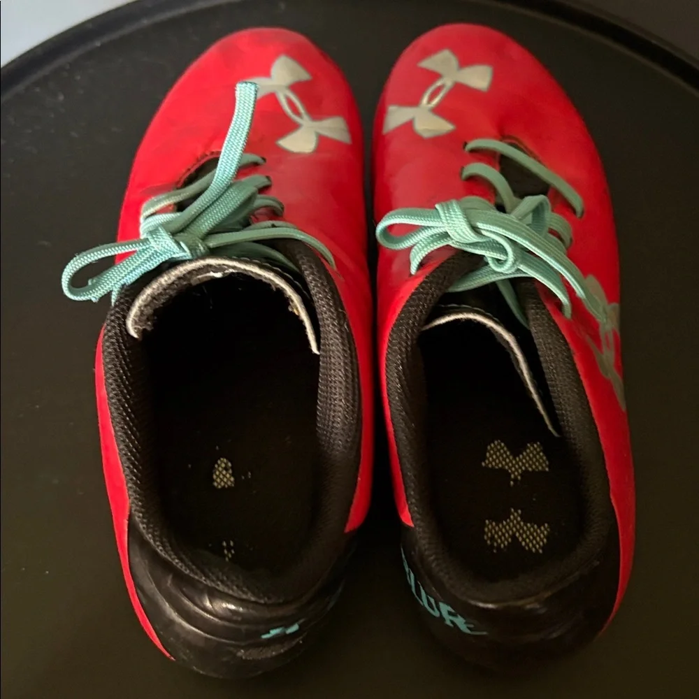 Under Armour size 1 Red and Teal Soccer Cleats